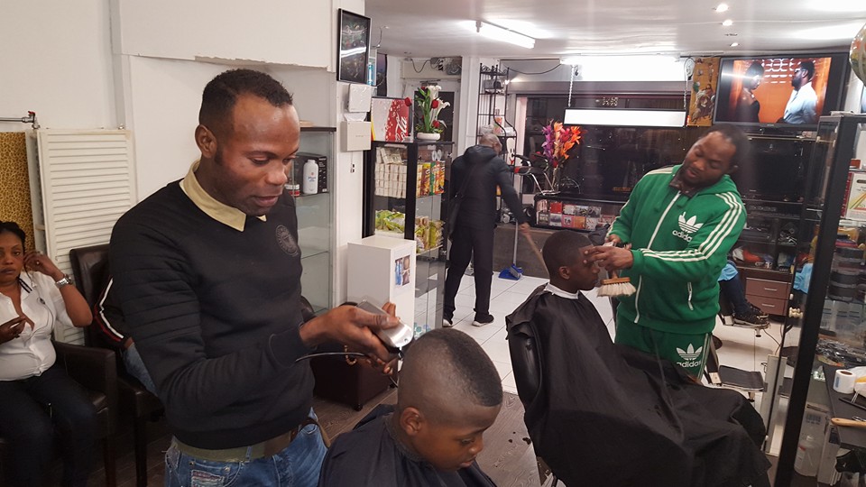 Two barbers at work